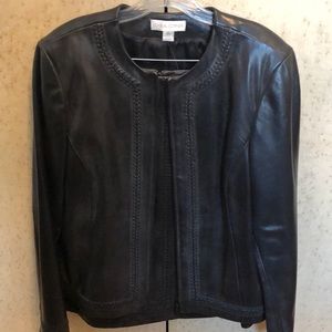 Leather jacket and a matching skirt.